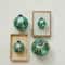 Hello Honey® 12 Pack 4" Turquoise Glass Ball Ornament with Eucalyptus Leaves